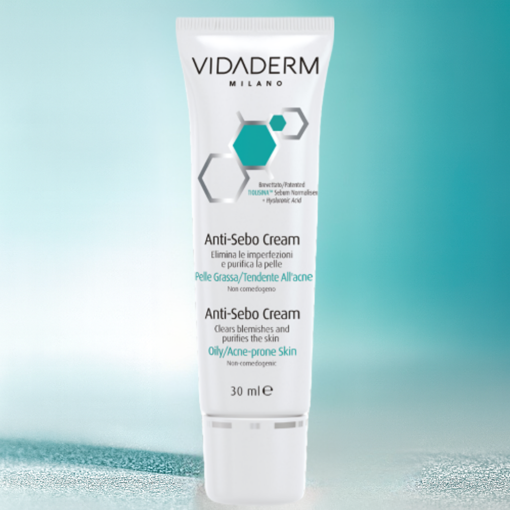 Vidaderm Anti-Sebo Cream tube on a gradient blue background