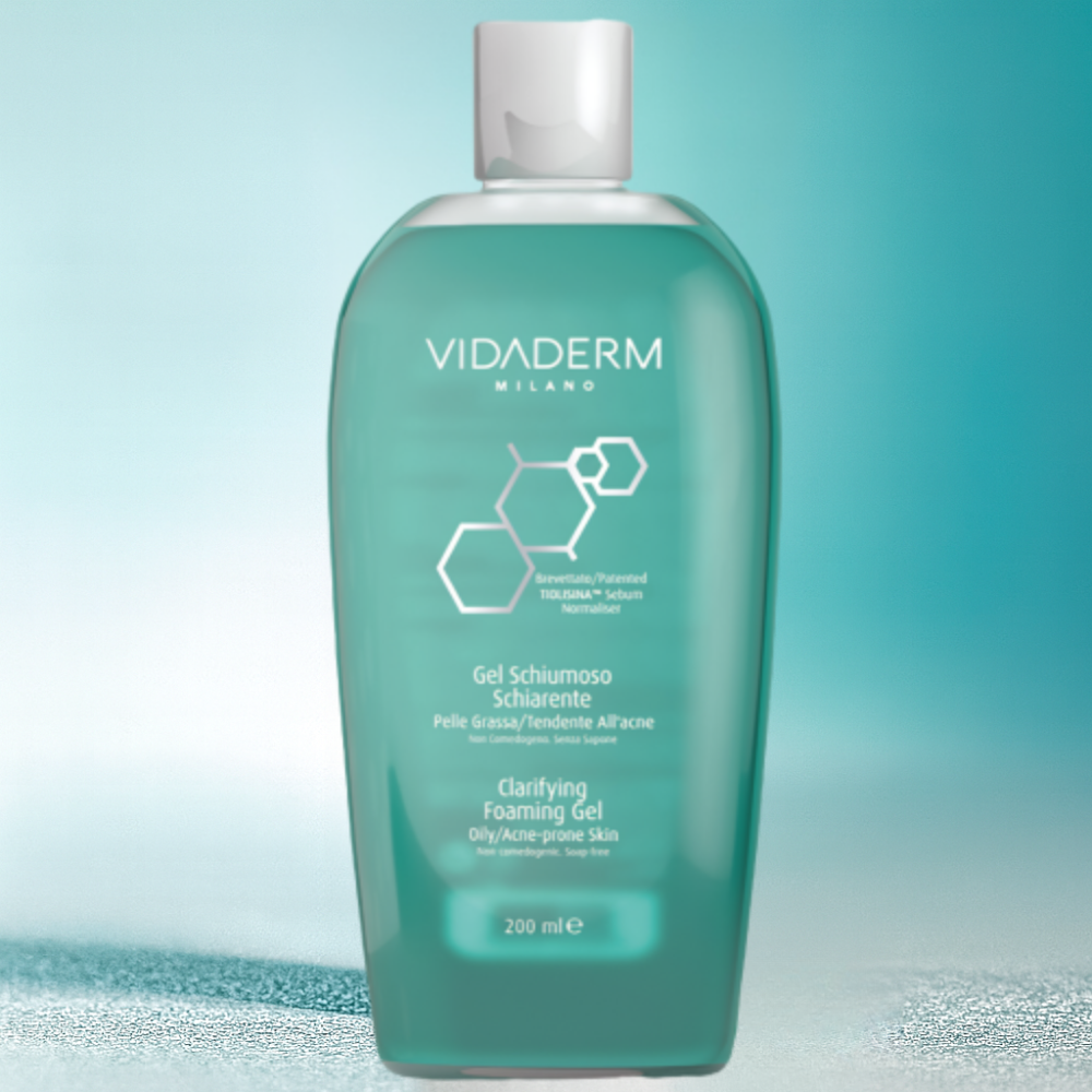 Vidaderm clarifying foaming gel bottle on a gradient blue background